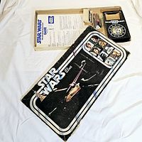 Star Wars board game with box, showing game components and lid with artwork; lid is missing sides