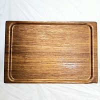 Top view of the rectangular wooden platter showing grain, shape, and surface condition.