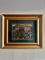 Framed Canadian landscape giclee print in gilded wooden frame seen from the front.