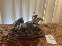 Full view of sculpture on table