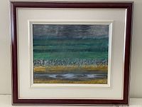 Full view of the framed acrylic painting attributed to Tom Momson showing abstract rainy landscape with horizontal bands in green, yellow, gray, and white colors.