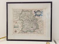 Full view of framed map showing frame and mat