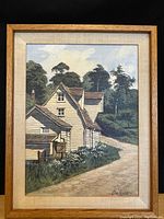 Full front view of framed watercolor painting; shows artwork, frame and matting