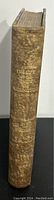 Spine view of book titled The Life of the Duke of Wellington with gold embossed text on leather spine.