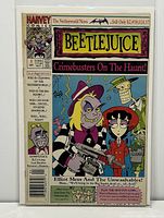 Front cover of Harvey Comics Beetlejuice #1 titled 'Crimebusters On The Haunt!' featuring main characters Beetlejuice and Lydia, with colorful artwork and text detailing contents and character appearances. Comic is bagged and boarded.