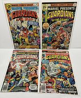 Four comic books (issues #5, 6, 7, and 8) bagged and boarded together, showing front covers with vibrant Guardians of the Galaxy artwork and Marvel Comics Group branding.