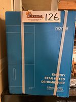 Front of sealed retail box showing Home branding and Energy Star 22 pint label