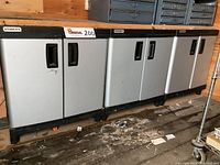 Three Stanley storage cabinets side by side