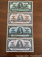 Overhead view of four 1937 Bank of Canada notes: $1, $2, $5, $10 obverse