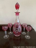 Full set: decanter with stopper and four stem glasses