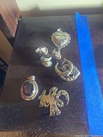 Overview of all sterling silver items on dark surface