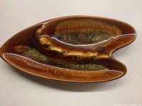 Top view showing the unique organic shape and glaze pattern of the ceramic ashtray.