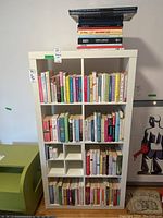 Full shelving unit with assorted books