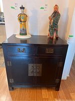 Front view of cabinet, drawers and doors closed.