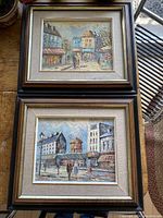 Two framed signed oil paintings stacked; showing their size and frames