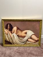 Full frontal photo of the framed canvas wall art showing the nude female reclining covered partially by a white cloth.