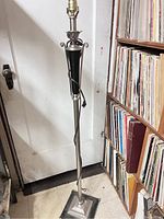 Full view of antique floor lamp showing overall design, construction, and condition.
