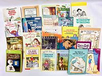 Photo of 20 assorted children's books showing front cover titles and illustrations.