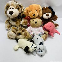 Overview of all plush toys in the collection showing different animals and colors.