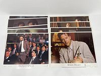 Eight Awakenings movie lobby cards and eight Angel Heart cards laid out side-by-side showing the front images of the cards.