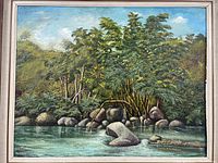 Front view of framed oil painting showing a river with rocks and trees under a partly cloudy sky.