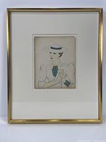 Framed fashion illustration showing full artwork and frame in gold-tone.