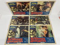 Six "Dr. Terror's House of Horrors" vintage lobby cards spread out showing different scenes and the movie title with skull artwork.