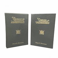 Front cover view showing full leather charcoal grey covers with gold gilt lettering and crest for both volumes, author name at bottom