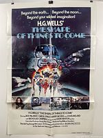 Full view of The Shape of Things to Come movie poster with visible fold lines and slight blemishes, title front and center