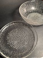 Overview of the glass plate and bowl showing textured bubble and linear patterns