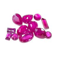 Loose ruby gemstones of various cuts and sizes with vibrant pinkish-red color, total 3.1ct