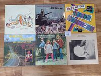 Six vinyl LP albums arranged in two rows, showing covers with some age-related wear.