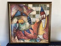 Full front view of abstract mixed media painting on canvas framed with wooden frame.