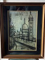 Framed black and white print by Bernard Buffet depicting cityscape with domes and towers.