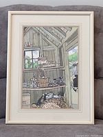 Photo showing the framed print resting on a cushioned surface to capture the entire frame and artwork.