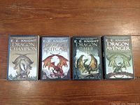 Four books by E.E. Knight laid out in a row showing full front covers.