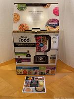 Front view of the Ninja Foodi Power Blender & Processor System box showing product image and features.