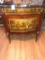 Front view showing drawer, door panels with painted couple scene and green marble top