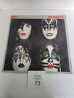 Front cover of KISS Dynasty 1979 vinyl LP showing band members' faces in makeup.