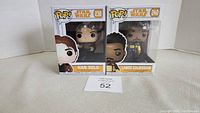 Two Funko Pop! Star Wars figures in original sealed boxes: Han Solo #238 and Lando Calrissian #240