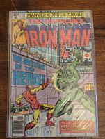 Front cover of The Invincible Iron Man #135 comic book showing Iron Man fighting a green robotic enemy with text 'The Return of the Hero' and other cover details.