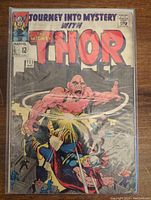 Front cover photo showing full comic cover with 'Journey Into Mystery with The Mighty Thor' title, Marvel logo, and issue number 121 with October date.