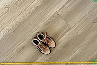 Top-down view of the gold sparkle Vans children’s shoes size 3, showing the sparkling upper and overall condition.