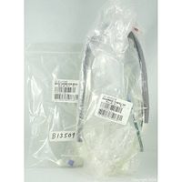 Two sealed plastic packages containing tubing harness components labeled B13509 and A99920 compatible with Beckman Coulter hematology analyzers.