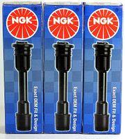 Three boxed NGK spark plug boots side by side showing front packaging with NGK logo and product image.