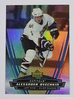 Front view of one 2006 Upper Deck Alexander Ovechkin hockey card with holographic background showing player in white Capitals jersey.