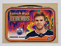Front side of Connor McDavid Lunch Box Legends special insert card showing colorful psychedelic lunch box design and player image.