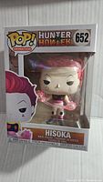 Front view of unopened Hunter Hisoka Funko Pop figure #652 in original box highlighting figure details and packaging.