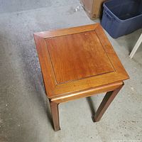 View of the side table top showing the wood grain and structure