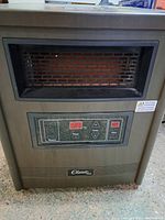 Front view of the heater showing digital control panel, power button, temperature adjustment buttons, timer, and brand label.